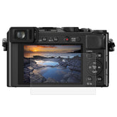 PULUZ 2.5D 9H Tempered Glass Film for Panasonic DMC-LX100, Compatible with Panasonic TX1 / TX2 / LX100II / LX100 / GF2 / GF3 / GF5 / GF6 / WEA / GM1 / FL1GK / GX7 / GF9 / GF8 / GF7 / GM1S / TZ70 / TZ90 / TZ85 / FZ85 / TZ57, FUJIFILM A1/ A2 / XM1/ X30...