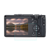 PULUZ 2.5D 9H Tempered Glass Film for Ricoh GR II / GR, Compatible with Casio ZS29 / ZS28 / ZS27 / Z550, Panasonic SZ10, Sony A58 / 55 / DSC-WX60 / DSC-W730, Canon IXY210 / A3300 / SX70 / S90 / G1X, For Ricoh GR II